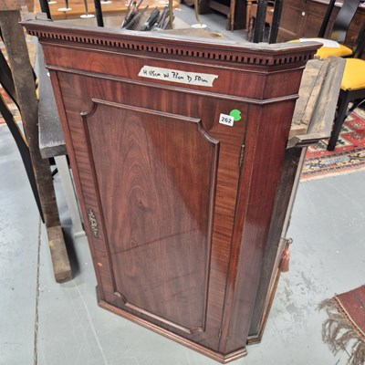 Lot 262 - A 19th century mahogany corner cabinet H 115cm.