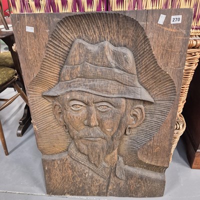 Lot 270 - A carved hardwood panel. 85 x 58cm