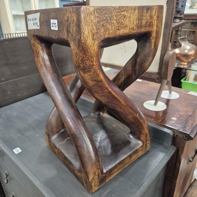 Lot 273 - A carved hardwood stand. H 51 W 30 D 30cm.