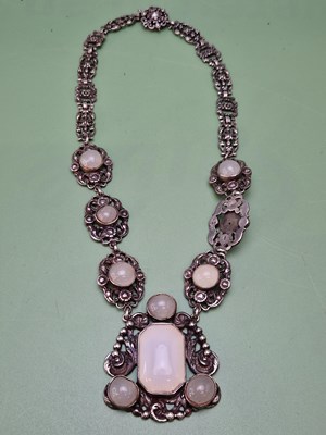 Lot 1065 - A vintage silver necklace composed of...