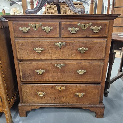 Lot 285 - An early 18th century crossbanded small chest...