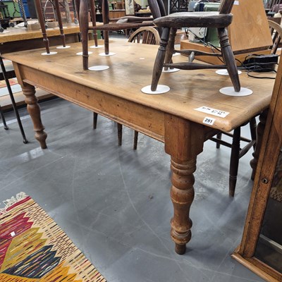 Lot 291 - A vintage pine kitchen table. H 74 W 182 D 92cm.
