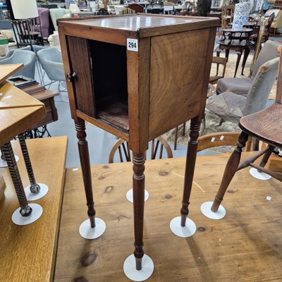 Lot 294 - A mahogany bedside cabinet. H 78 W 31 D 31cm.