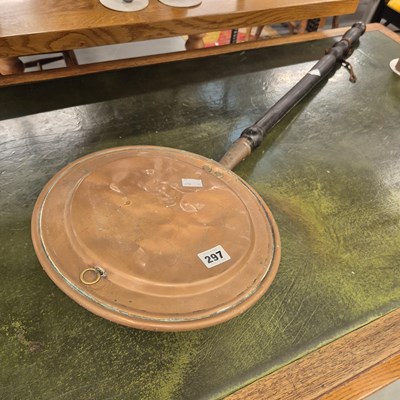 Lot 297 - A copper warming pan.