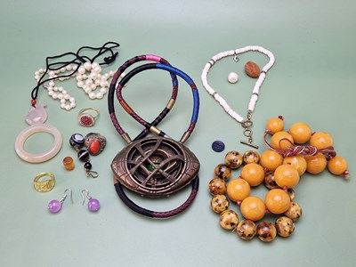 Lot 1067 - A collection of eastern beaded necklaces, two...