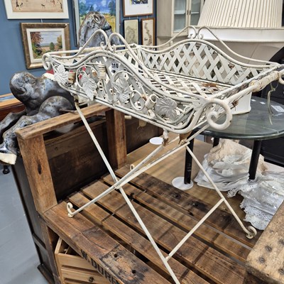 Lot 310 - A wrought iron conservatory stand.