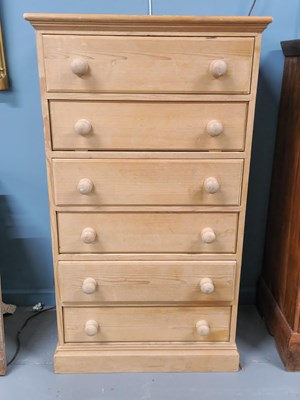 Lot 318 - A pine chest of drawers. H 113 W 65 D 43cm.