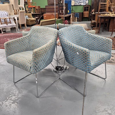 Lot 332 - A set of four retro armchairs with chrome legs.