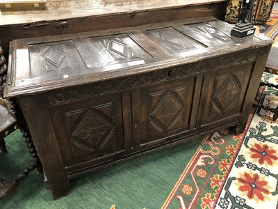 Lot 336 - An 18th century oak panel front coffer. H 72 W...