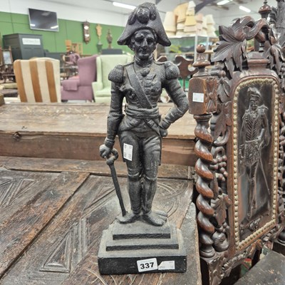 Lot 337 - A cast iron door stop in the form of Nelson. H...