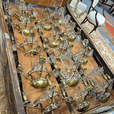 Lot 343 - A set of ten gilt brass and cut glass wall lights