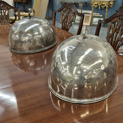 Lot 354 - Two silver plated meat covers. H 27 W 45 D 35cms