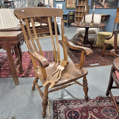 Lot 355 - An antique large kitchen armchair.