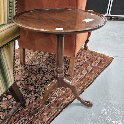 Lot 360 - An antique mahogany tray top tripod table. H...