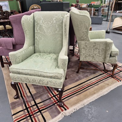 Lot 366 - A pair of antique, Georgian style wing back...