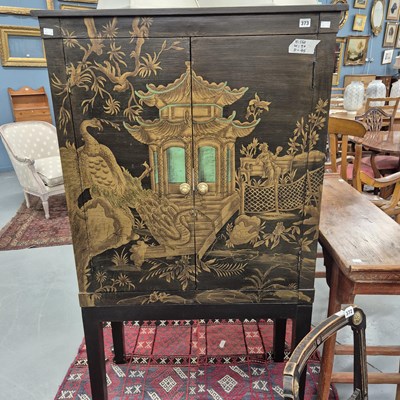 Lot 373 - An oriental style side cabinet H 160 W 90 D 45cm.
