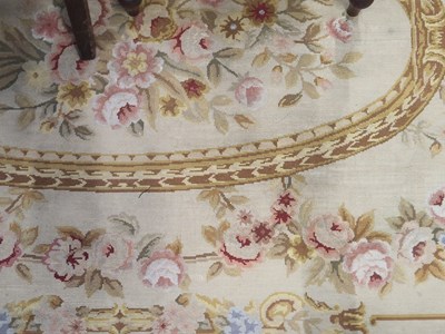Lot 1158 - A needlepoint rug of neoclassical design,...