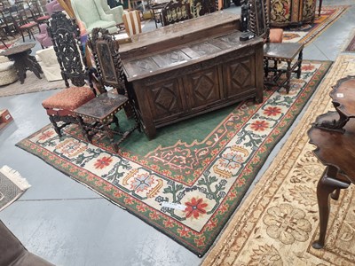 Lot 1162 - A hand knotted antique rug of Arts and Crafts...