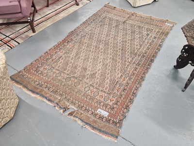Lot 1163 - An antique Persian tribal rug 225cm x 143cm