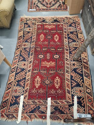 Lot 1171 - A Turkish tribal rug, 124cm x 196cm