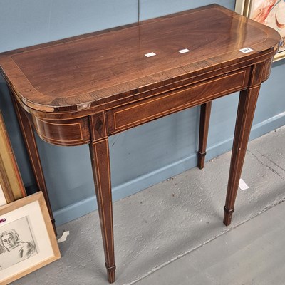 Lot 397 - A late Georgian fold over table. H 73 W 77 D 37cm