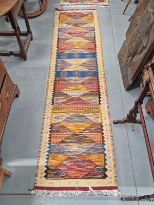 Lot 1177 - Three tribal Kelim rugs 248 x 74, 266 x 69,...