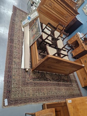 Lot 1179 - An antique Persian Kirman carpet 362 x 279 cm