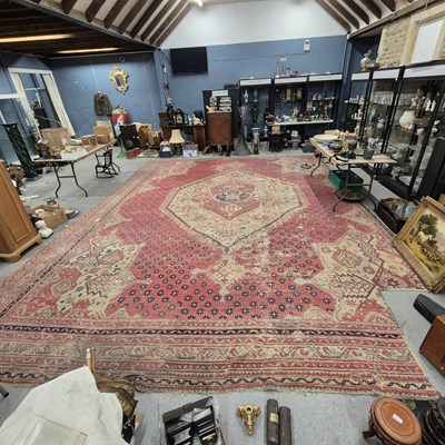 Lot 1170 - A large antique Turkish country house Oushak...