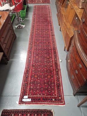 Lot 1185 - A Persian Hamadan runner 515cm x 89cm