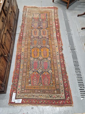 Lot 1188 - A tribal Caucasian runner 260 x 98cm