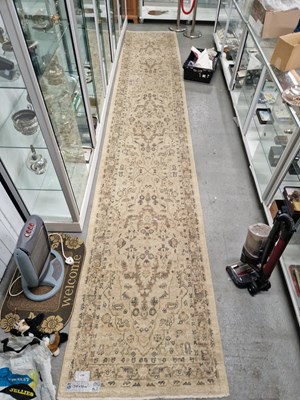 Lot 1192 - An oriental runner of Persian design 515 x 92cm