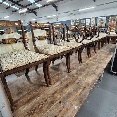 Lot 411 - A set of ten Regency-style brass inlaid dining...