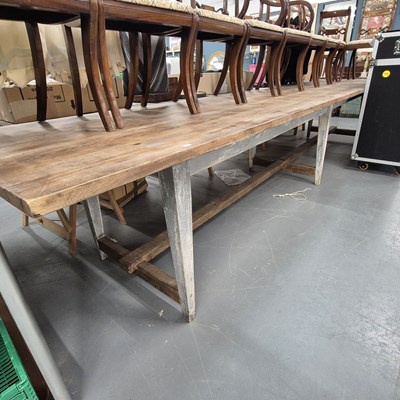 Lot 412 - A very large pine refectory style dining table....