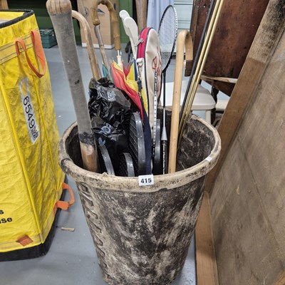 Lot 415 - A large vellum bucket, walking sticks etc.