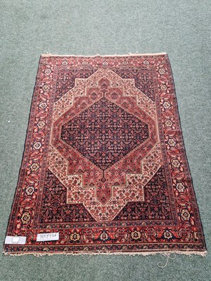 Lot 1223 - An antique Persian Senneh rug, 192 x 136cm