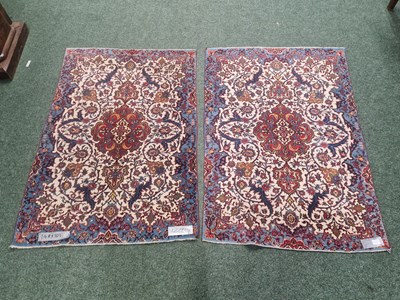 Lot 1229 - A pair of Persian Isfahan rugs, 148 x 103cms (2)