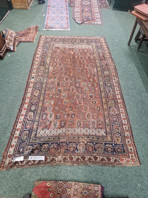 Lot 1230 - An antique Shiraz gallery rug, 328 x 173cm