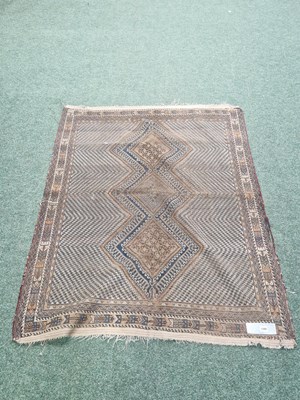 Lot 1200 - An antique Persian Shiraz rug. 176 x 130 cm