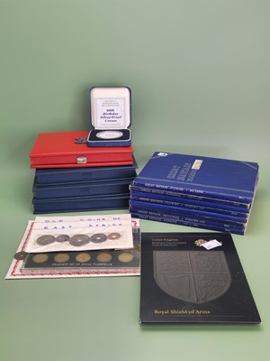 Lot 1103 - Two silver proof £5 coins, various proof sets...