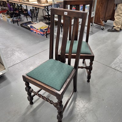 Lot 425 - A pair of oak dining chairs