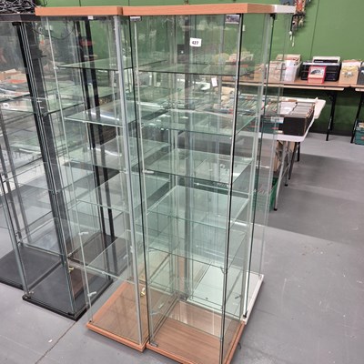 Lot 427 - Four upright display cabinets. H 163 W 43 D 37cm