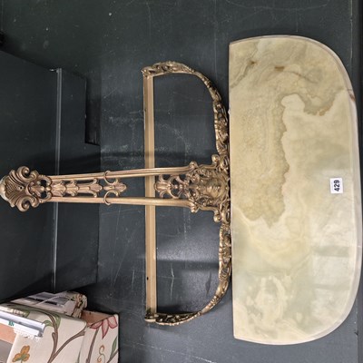 Lot 429 - A gilt brass marble topped console table. H 43...