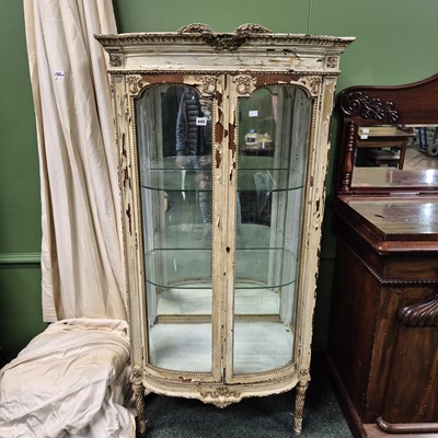 Lot 445 - A shabby chic French style bow front display...