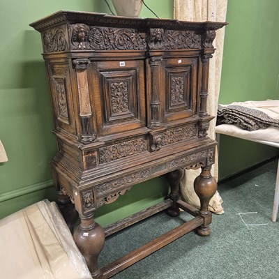 Lot 462 - A 17th century style oak cabinet on stand. H...