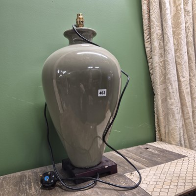 Lot 463 - A large green glazed table lamp.
