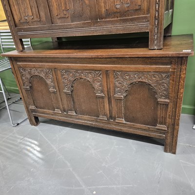 Lot 114 - An oak panel front coffer. H 62 W 122 D 50cm.