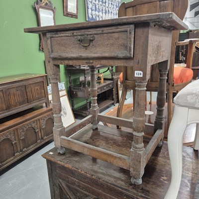 Lot 124 - An 18th century oak side table with single...