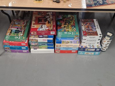 Lot 884 - A collection of boxed jigsaw puzzles