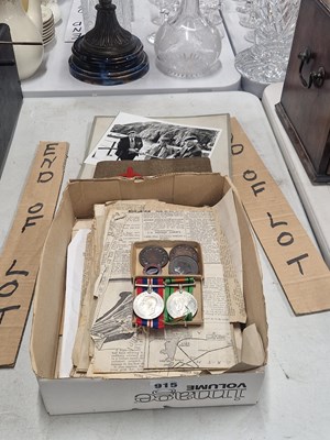 Lot 915 - WWII medals, newspaper cuttings together with...