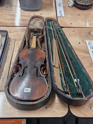 Lot 923 - A cased violin for repair together with two bows